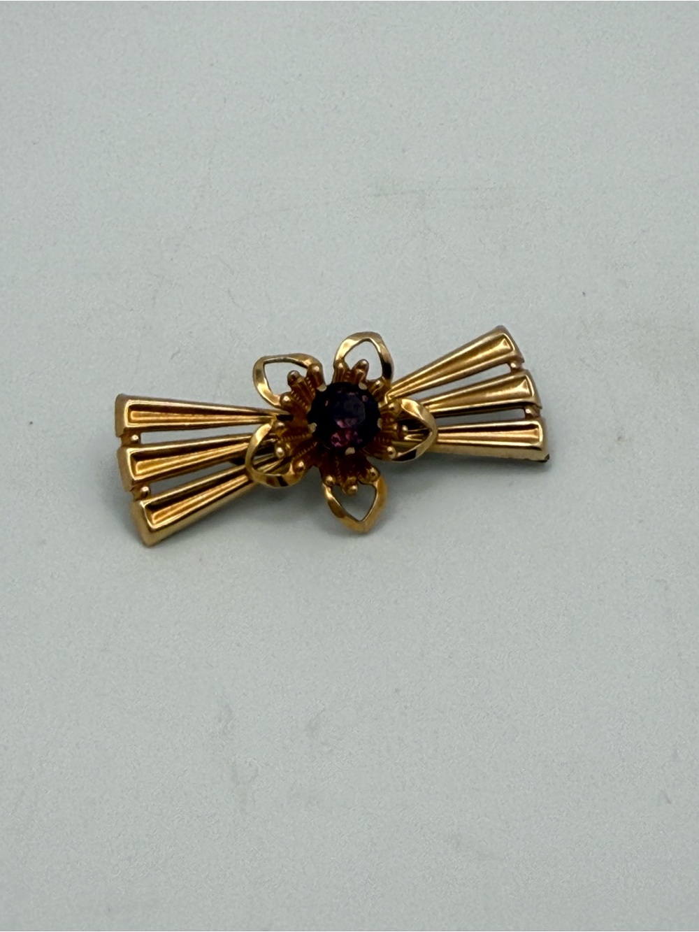 Van Dell Bow Brooch 12k GF with Deep Purple Glass Stone